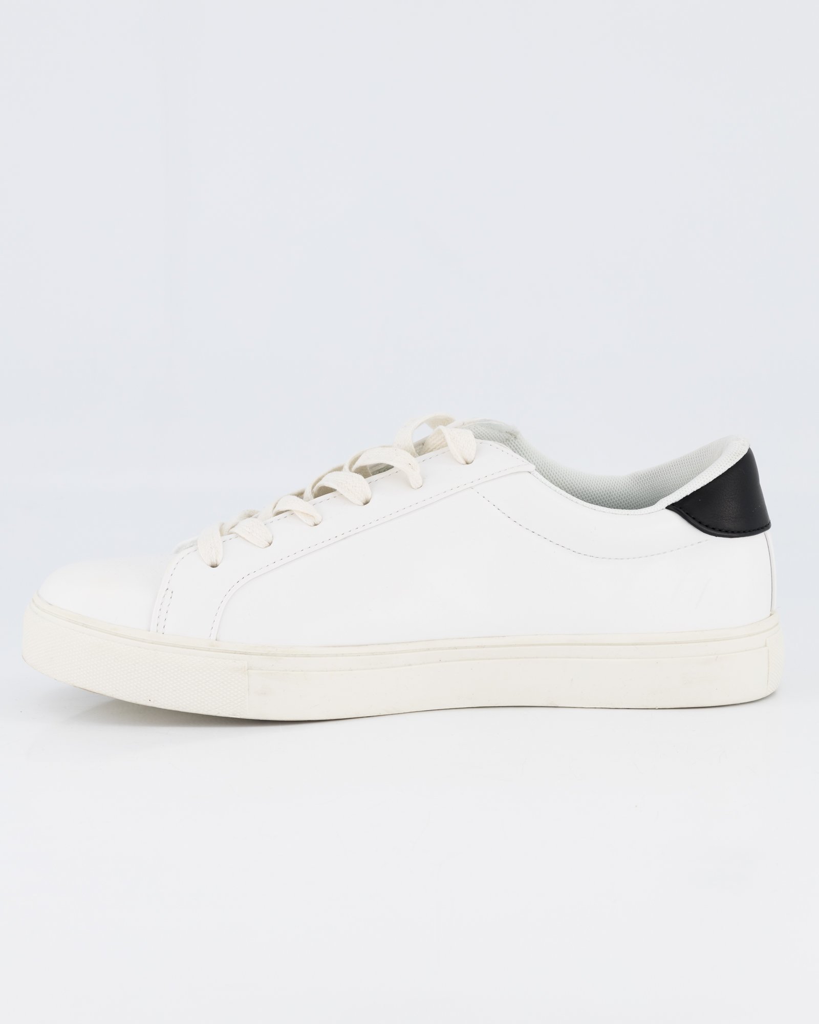 white trainers with black heel